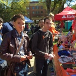 Two students visit the OSU Folk Club booth during Beaver Fair